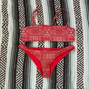 Frankie’s Bikinis red paisley swim suit